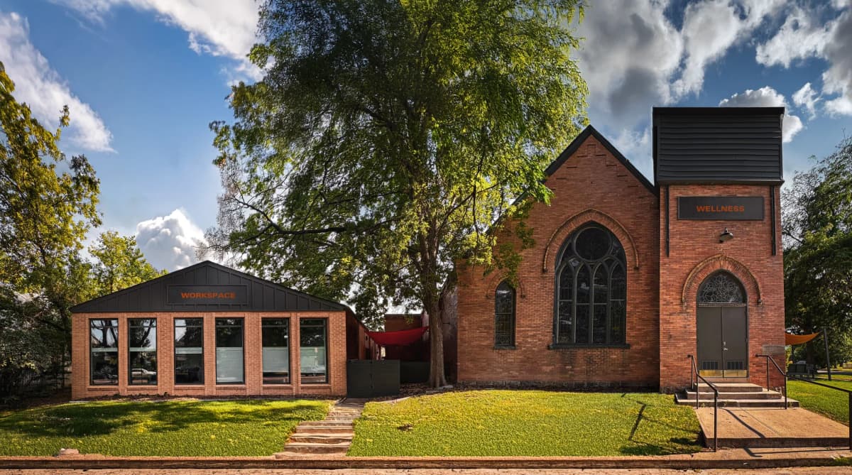 Historic Merritt Wellness building exterior showing 1905 church architecture